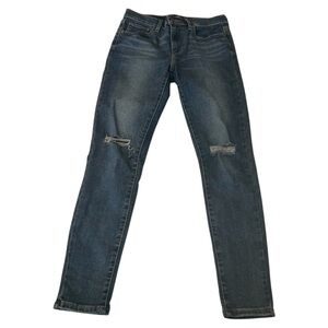Levi’s 720 High Rise Super skinny medium wash jeans ripped knees distressed